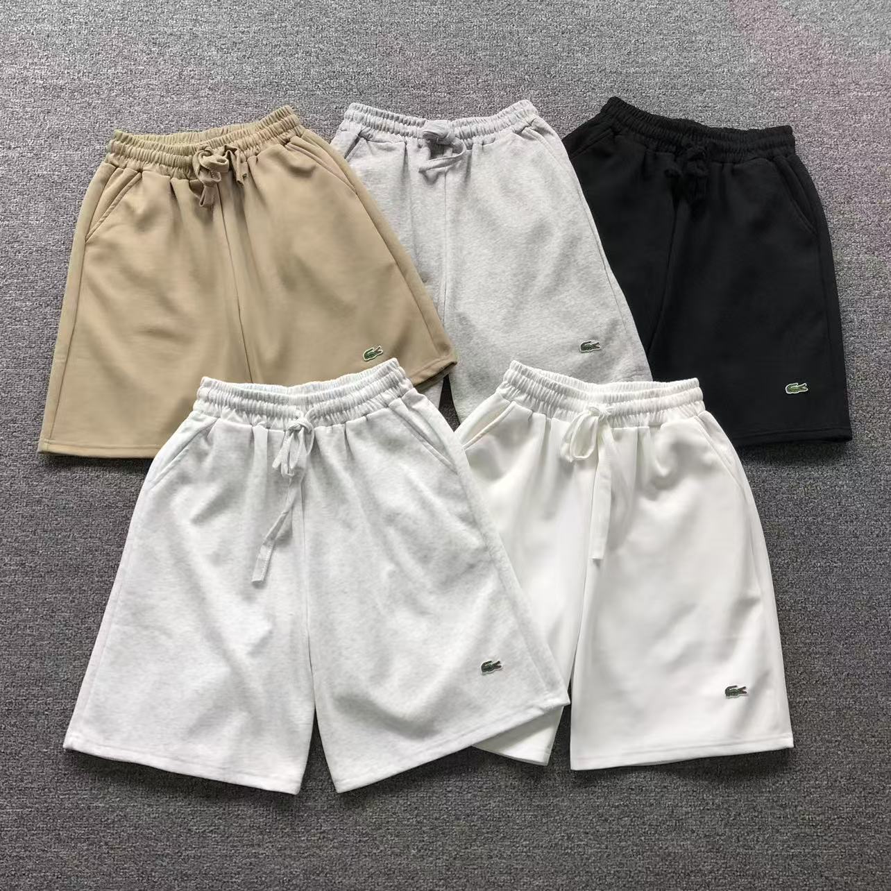 1# Lacoste hlače